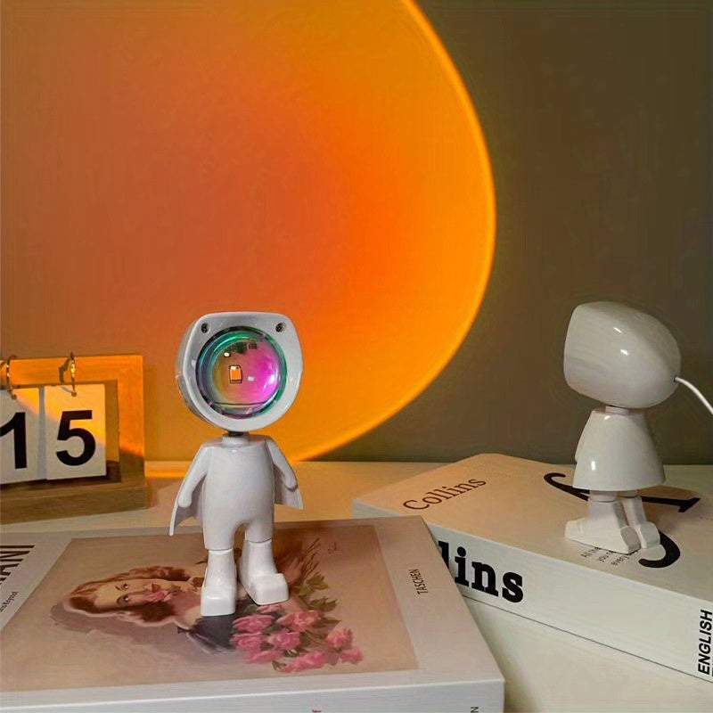 •	Lampă decorativă astronaut cu proiecție de apus curcubeu