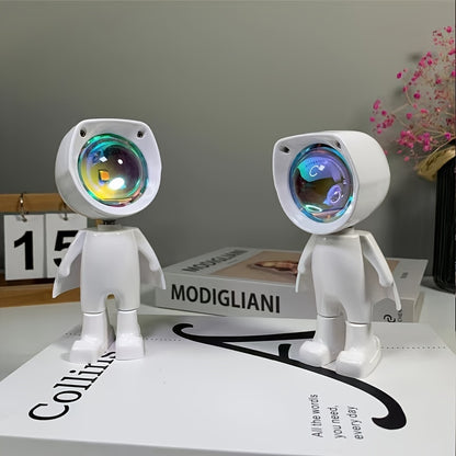 •	Lampă decorativă astronaut cu proiecție de apus curcubeu