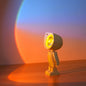 •	Lampă decorativă astronaut cu proiecție de apus curcubeu